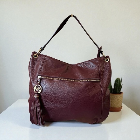 Michael Kors Handbags - Michael Kors Burgundy Leather Charm Tassel Hobo Bag